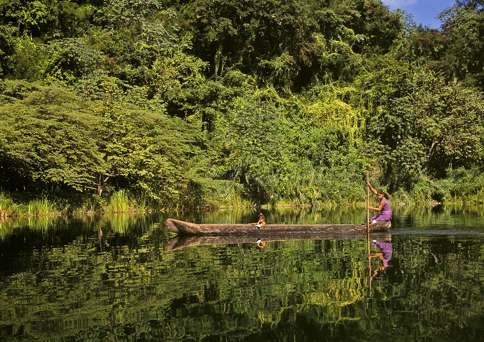 Mayan Woman Canoeing in Lake Petén-Itzá.(El Petén) Guatemala.